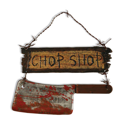 Wood look sign with bloody cleaver hanging from it
