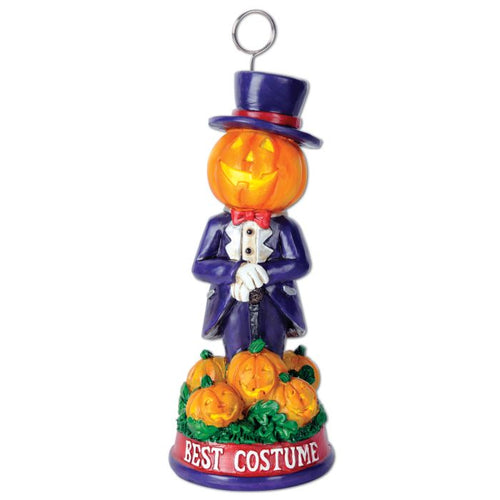 Halloween decoration with a jack-o'-lantern in a suit and top hat, surrounded by pumpkins, on a white background.