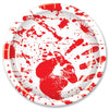 White plate with red splatter design on a white background