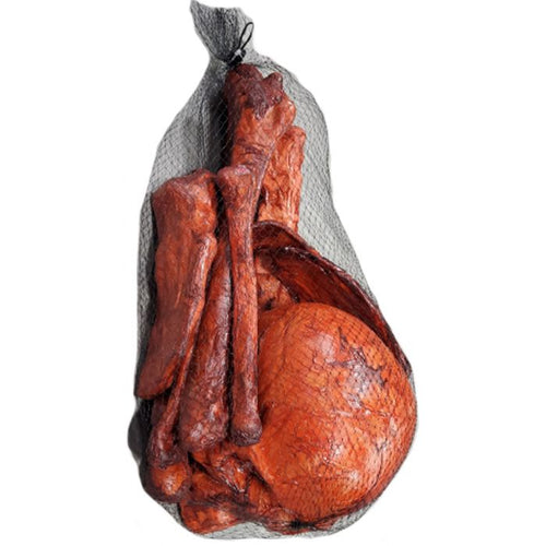 A large cured meat product, likely a salami or pepperoni roll, wrapped in a black mesh bag against a plain white background.
