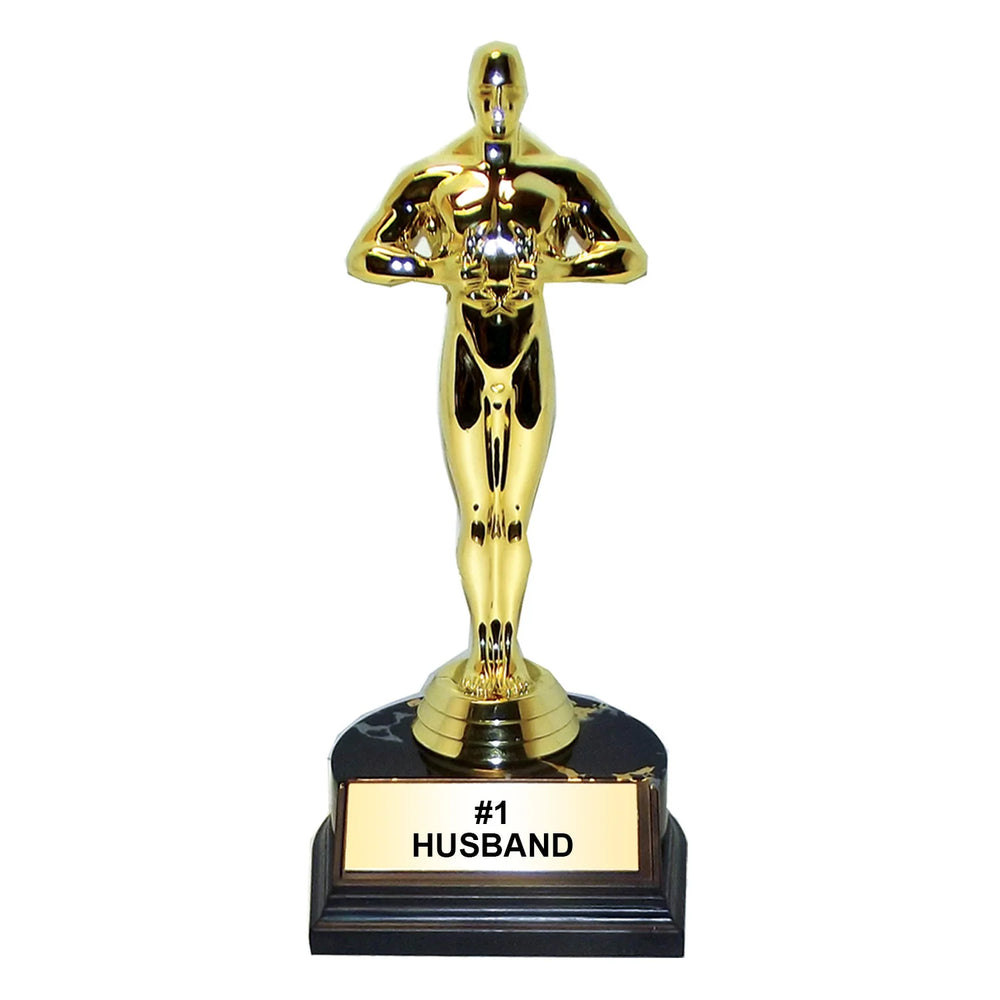 Gold trophy with a black base labeled '#1 Husband' on a white background