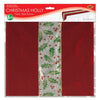 Red fabric table runner with Christmas holly design in packaging