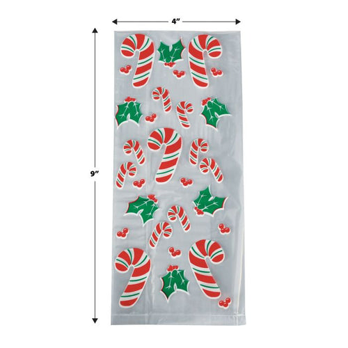 Christmas-themed window stickers with candy canes and holly leaves on a clear sheet, with dimensions indicated.