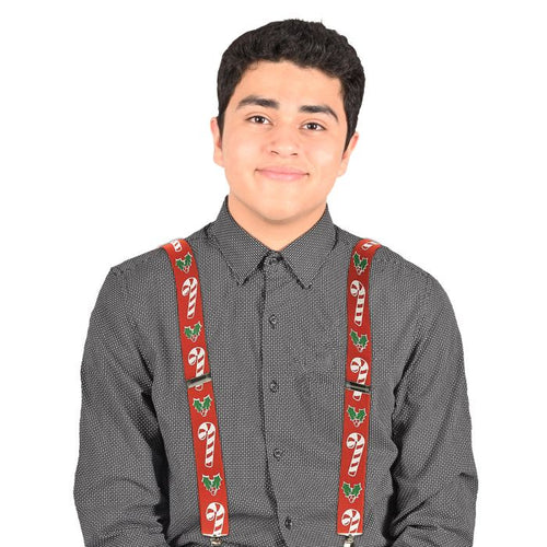 Person wearing red suspenders with candy cane design on a white background