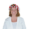 Woman wearing a festive headband with red and green decorations on a white background