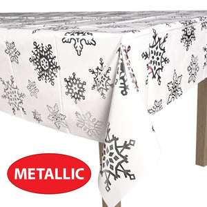 Tablecloth with black snowflake pattern and 'Metallic' label on a white background