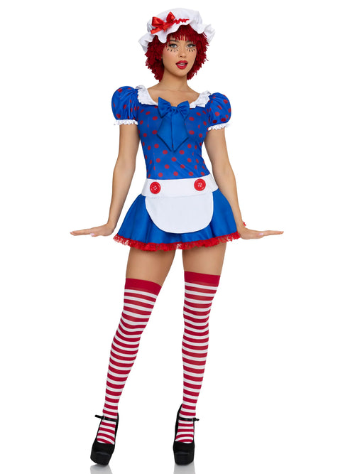 A woman modeling a Raggedy Ann costume against a plain white background. The costume includes a blue and red polka-dotted dress with a white apron, a white headpiece with a red bow, and red-and-white striped thigh-high socks.