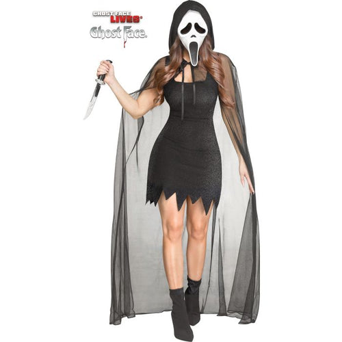 Person wearing a black Halloween costume with a white mask and cape, holding a knife.