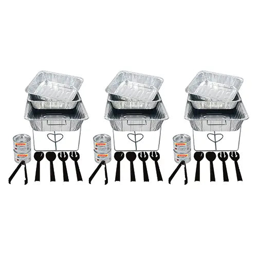 Set of disposable aluminum food containers with lids, spoons, and forks on a white background