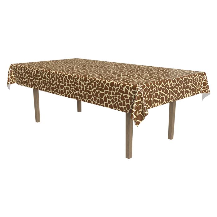 Table with a giraffe patterned tablecloth on a white background