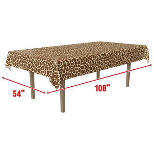 Giraffe patterned tablecloth on a table with dimensions indicated.