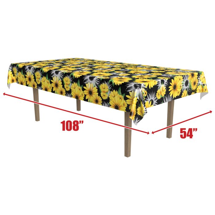 Table with a sunflower patterned tablecloth, dimensions indicated.