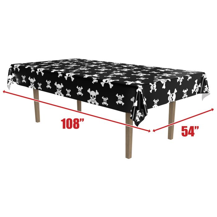 Black tablecloth with white skull and crossbones pattern, displayed on a table with measurements indicated.