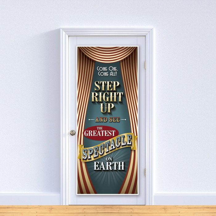 Decorative door with circus-themed poster on a white wall.
