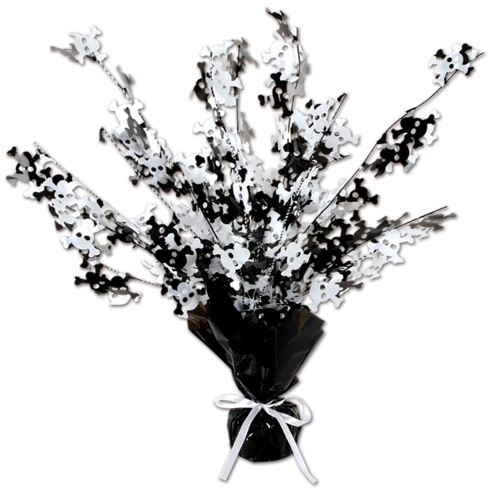 Decorative black and white floral arrangement with a white bow on a white background