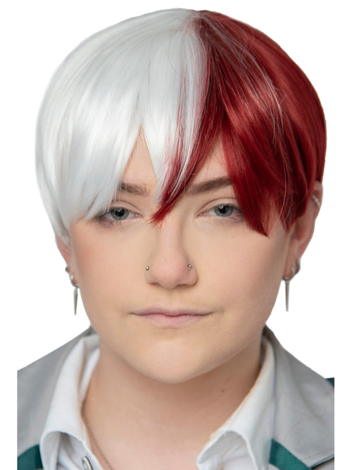 Person with a half-white, half-red wig on a white background