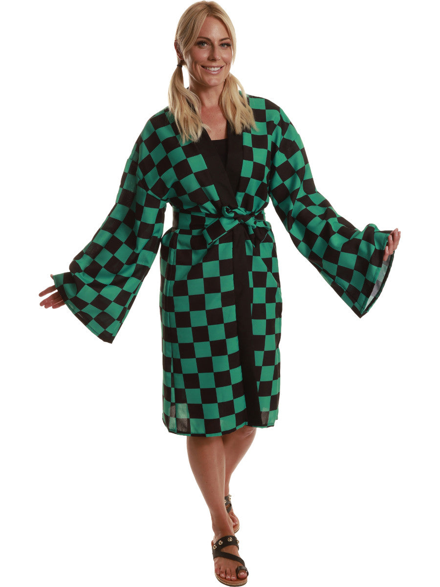 Woman wearing a green and black checkered robe on a white background