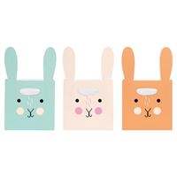 Three cartoon rabbit face stickers in pastel colors on a white background
