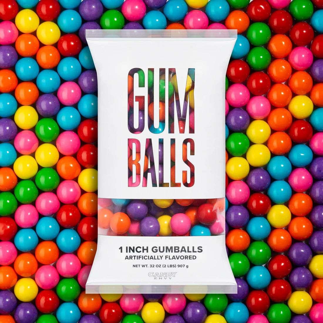 Packaging of 1-inch gumballs surrounded by colorful gumballs
