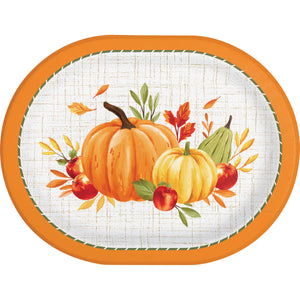 An oval decorative serving platter with a bright orange rim and a fall harvest illustration featuring two pumpkins, apples, leaves, and a pear on a white textured background.