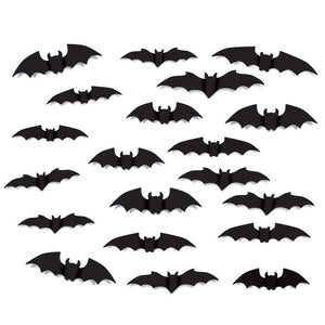 Set of black bat-shaped decorations on a white background