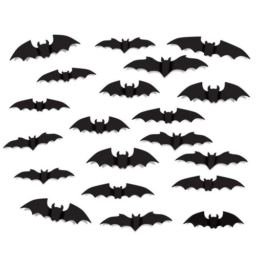 Set of black bat-shaped decorations on a white background