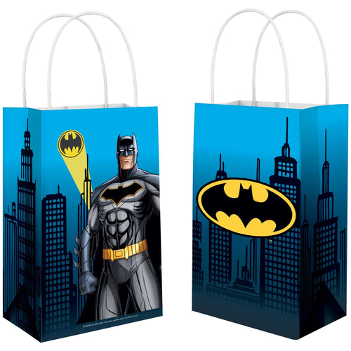 Two Batman-themed gift bags with cityscape design and superhero figure.