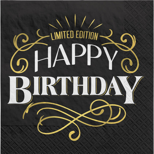 Black napkin with 'Happy Birthday' text in gold and white