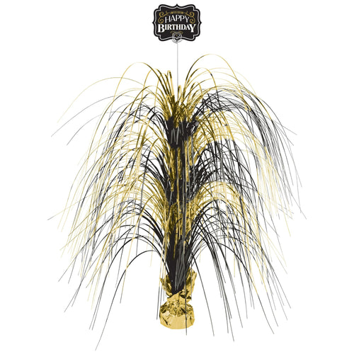 Decorative birthday centerpiece with gold and black streamers on a white background