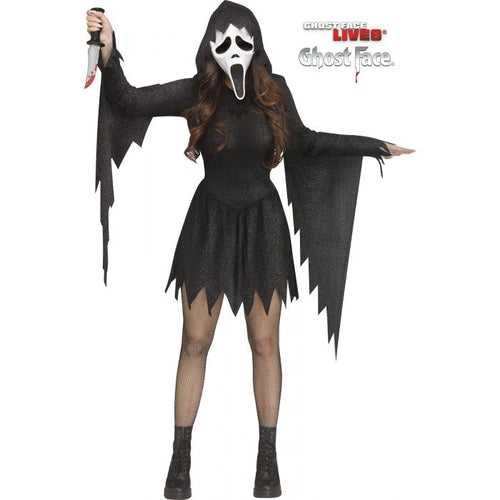 A woman modeling a Ghostface Halloween costume against a white background, holding a knife prop. The costume includes a black hooded dress with jagged hem and wing-like sleeves, a white Ghost Face mask, and black tights and boots.