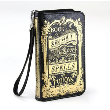 Book-shaped wallet with decorative cover on a white background