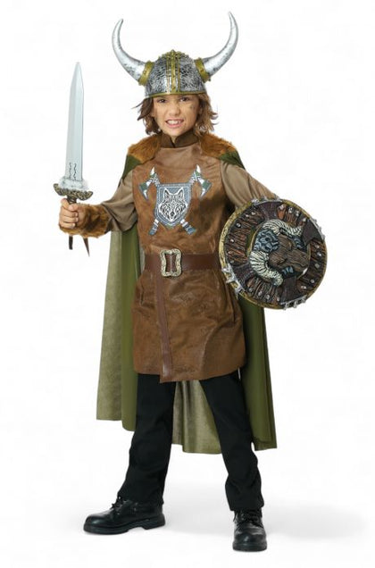 Child in a Viking costume holding a sword and shield on a white background