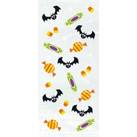 Halloween-themed decorative paper with candy corn, ghosts, and bats on a white background