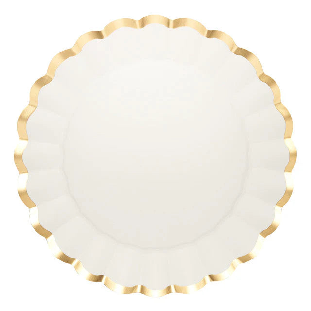 Round white plate with gold rim on a white background