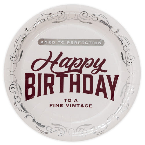 Round white plate with maroon text 'Happy Birthday to a fine vintage' on a white background