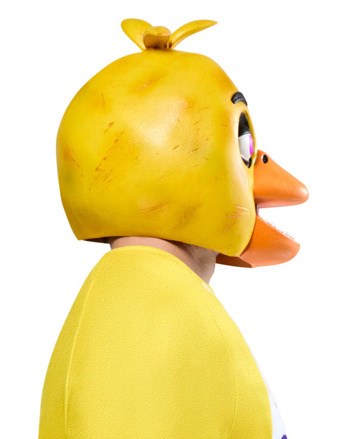 Person wearing a yellow chicken costume with a white background