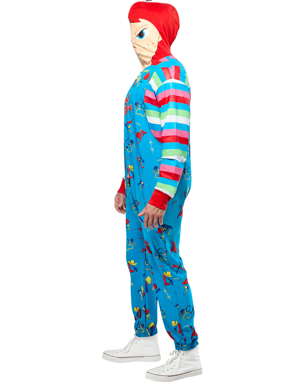 Person wearing a colorful onesie with cartoon characters on a white background