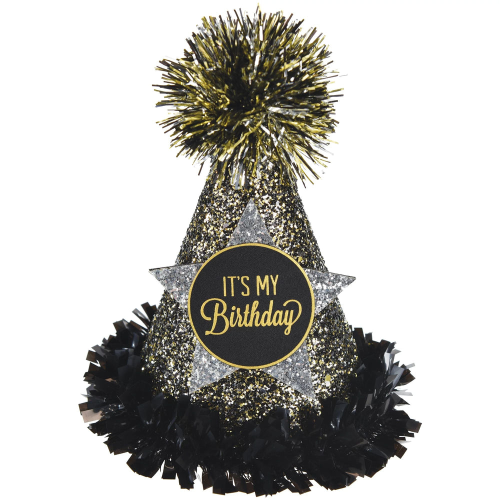 Decorative birthday hat with black, gold, and silver accents on a white background