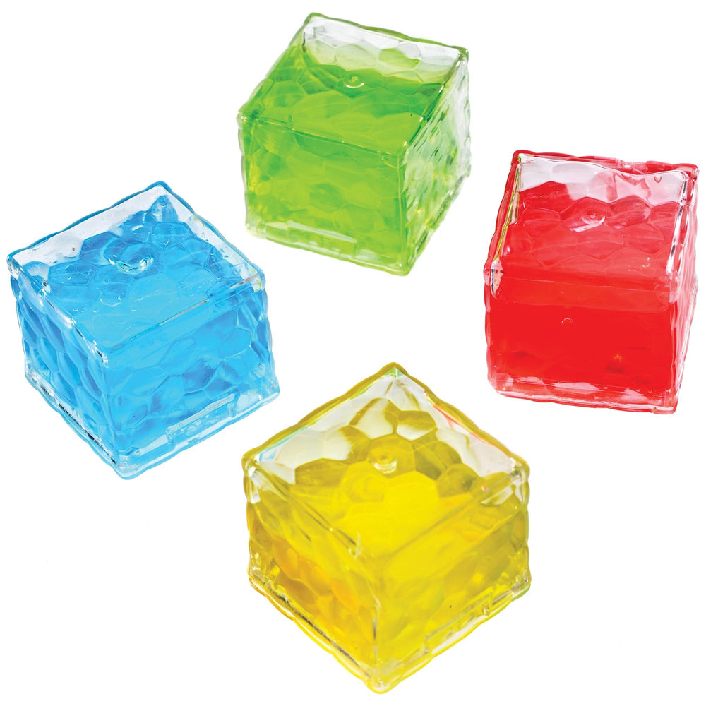 Four colorful translucent cubes in blue, green, red, and yellow on a white background