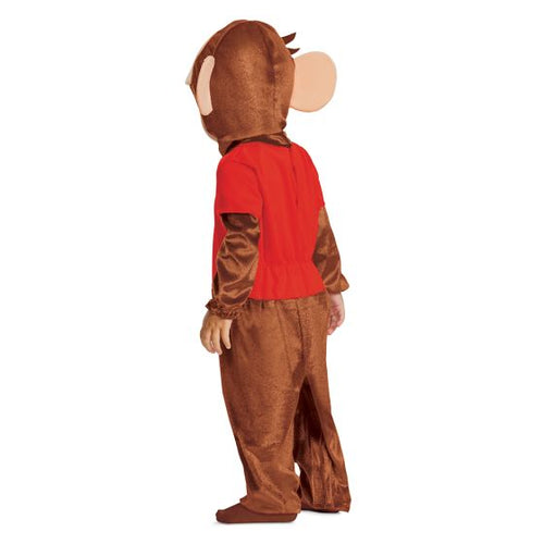 Child wearing a monkey costume with a red shirt and brown pants on a white background
