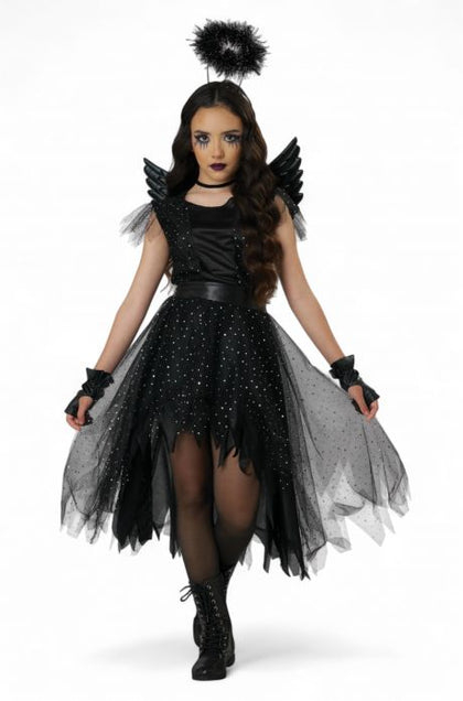 Woman wearing a black and gray costume with wings on a white background