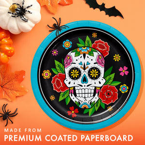 Halloween-themed paper plate with colorful skull design on an orange background with pumpkins and bats.