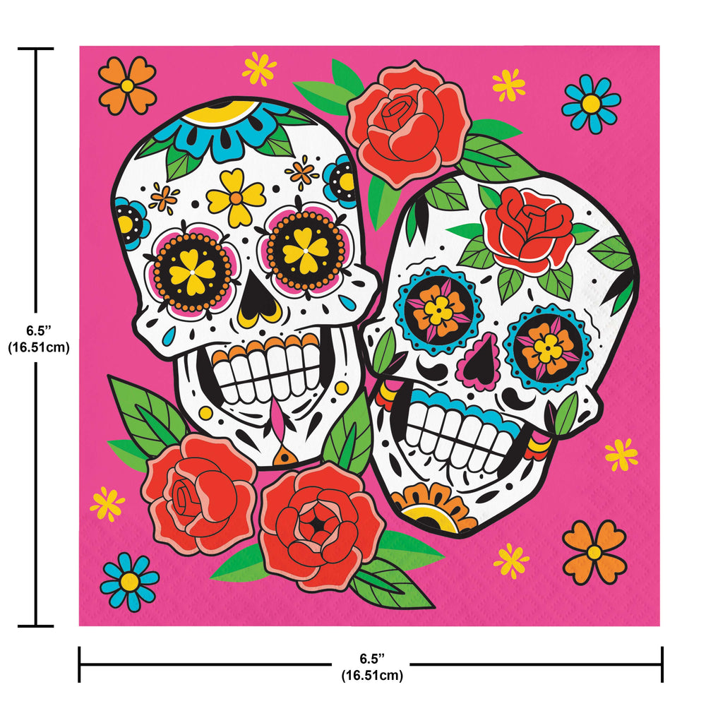 A square decorative print or poster featuring two colorful sugar skulls with roses on a bright pink background, shown with dimension lines and labels indicating 6.5 inches (16.