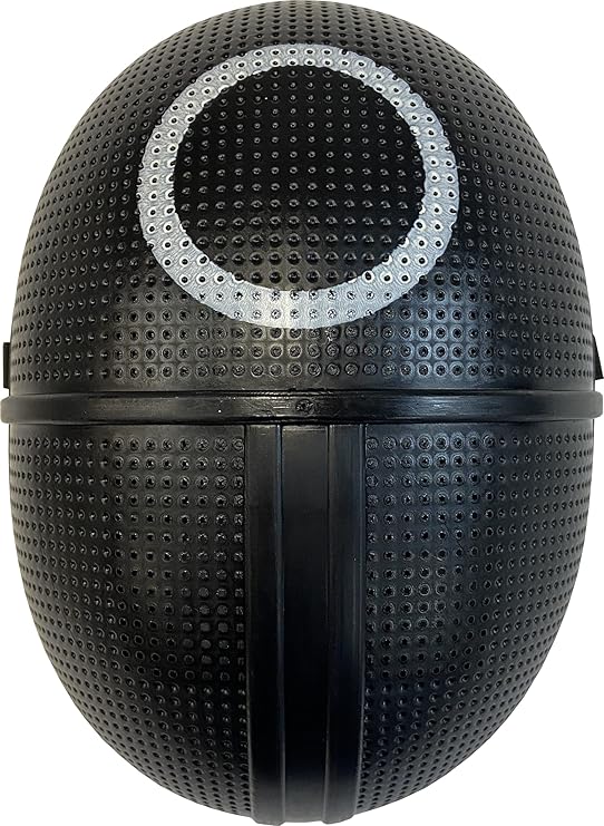 Black textured ball with a circular cutout on a white background