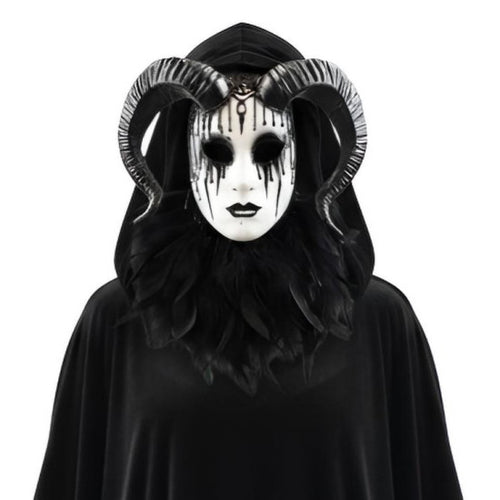 Person wearing a black hooded garment and a white mask with black accents on a white background