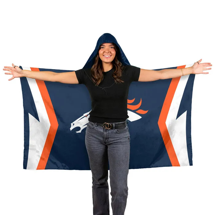 Person wearing a hooded blanket with a sports team logo on a white background