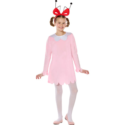 Child wearing a pink dress with a red bow headband on a white background