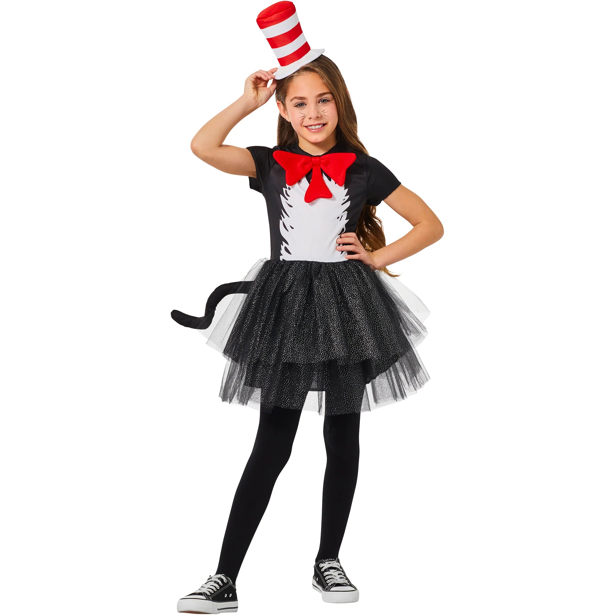 Child wearing a black and white costume with a red and white hat on a white background