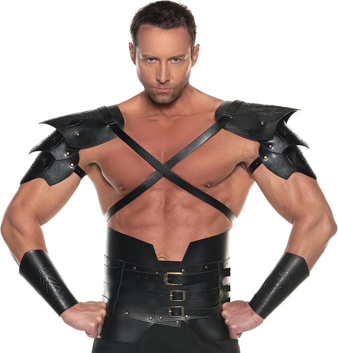 Man wearing a black leather costume with shoulder pads and arm guards on a white background