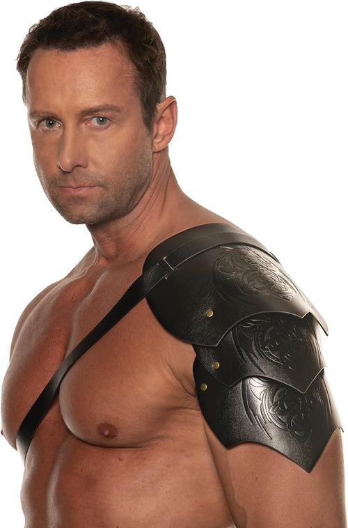 Man wearing a black leather shoulder piece on a white background